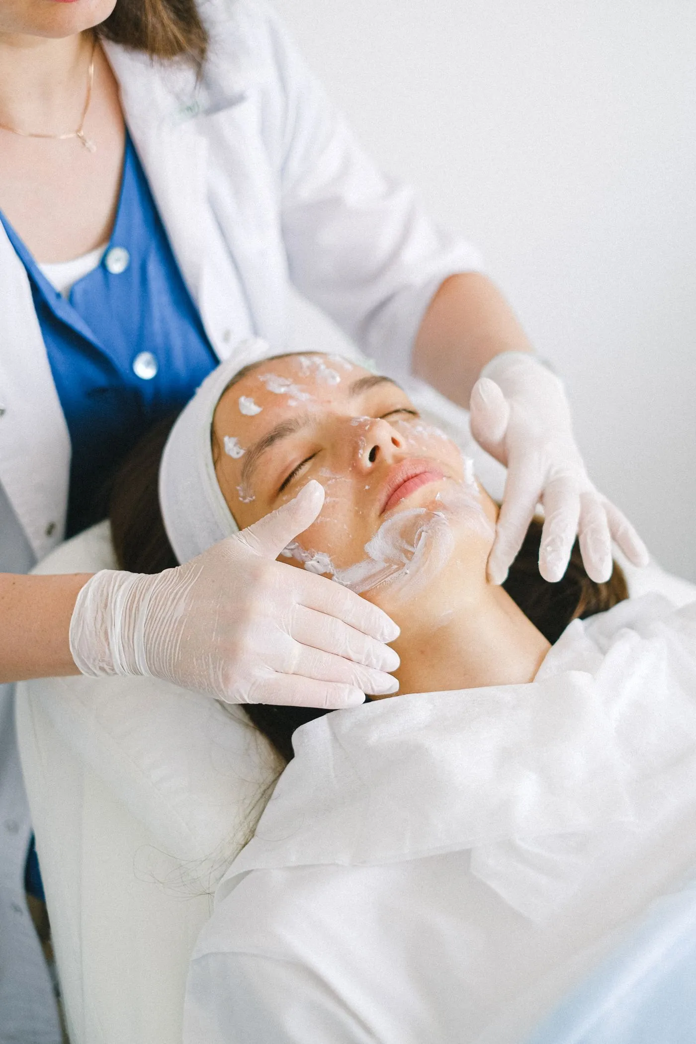 A calm facial treatment underway in a bright, clean clinic room